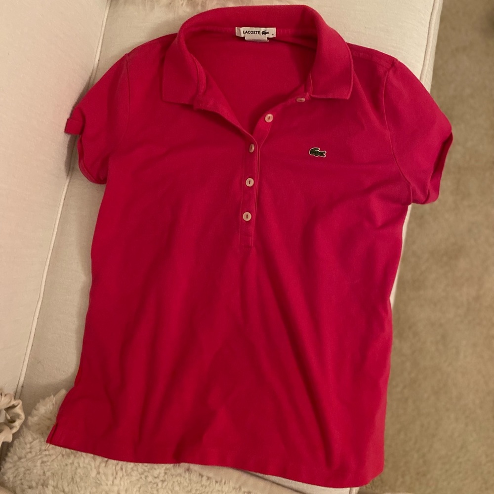 Women’s pink Lacoste polo tee shirt